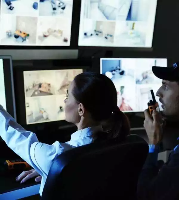 security guard monitoring warehouse
