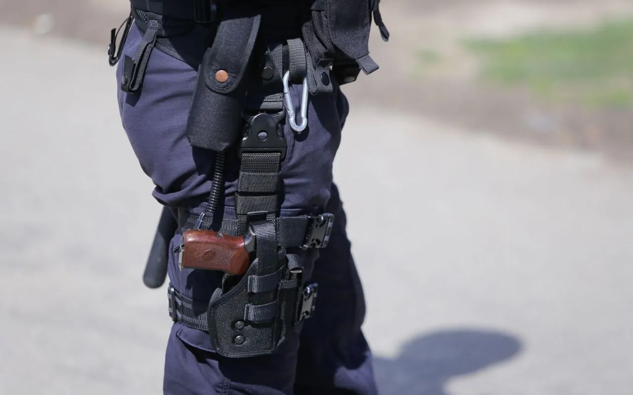 Armed security officer monitoring a construction site in Houston