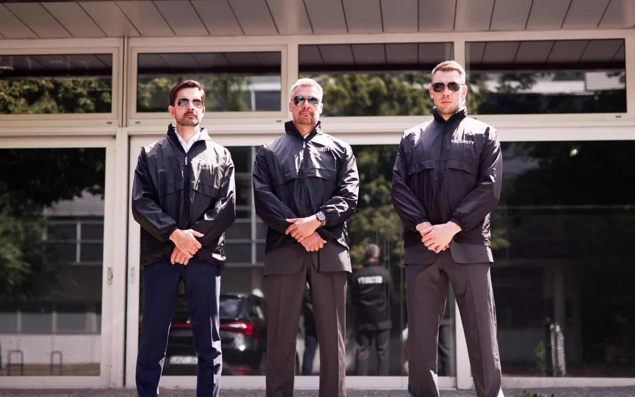 Professional Houston security guards standing in uniform outside office building