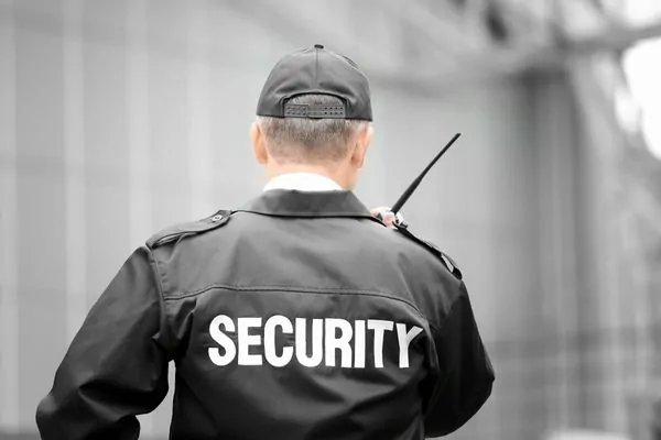 Security guard monitoring shopping center exterior