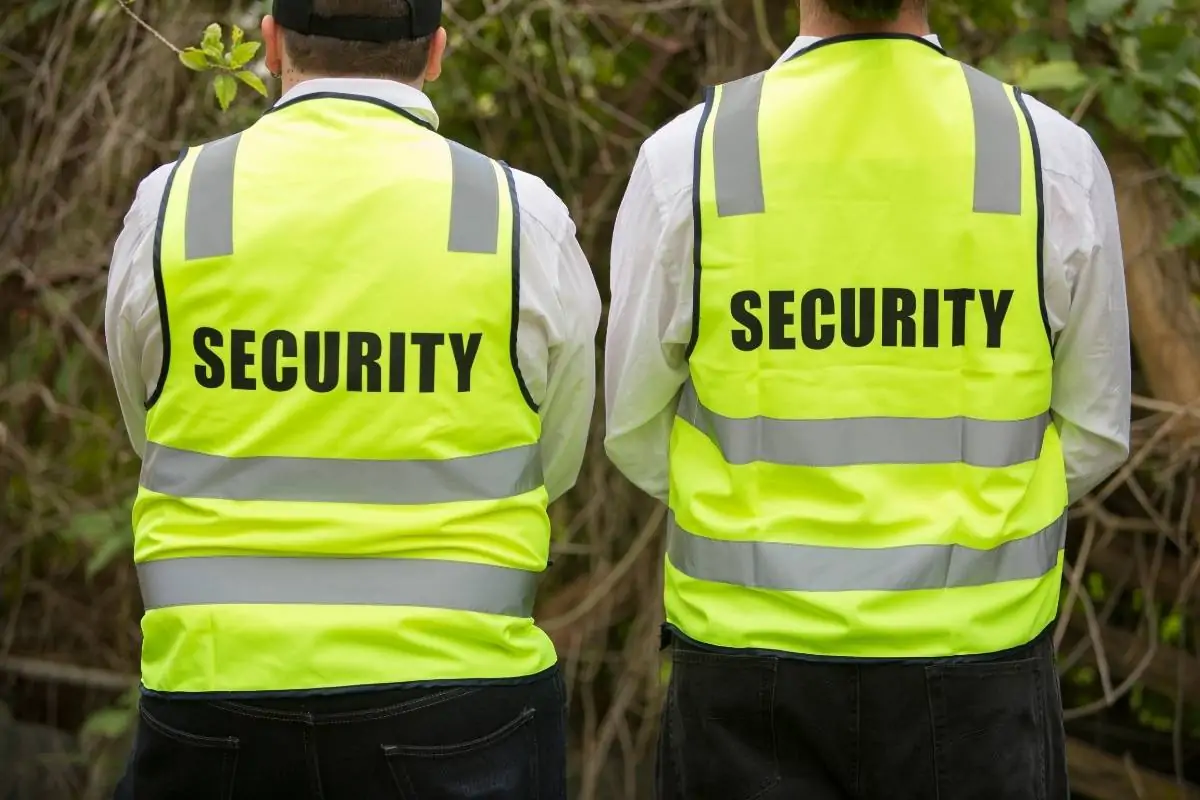 Security guards wearing high-vis uniform