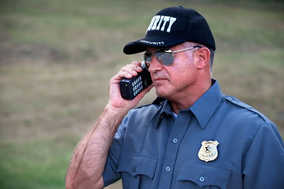 Construction security guard patrolling on site
