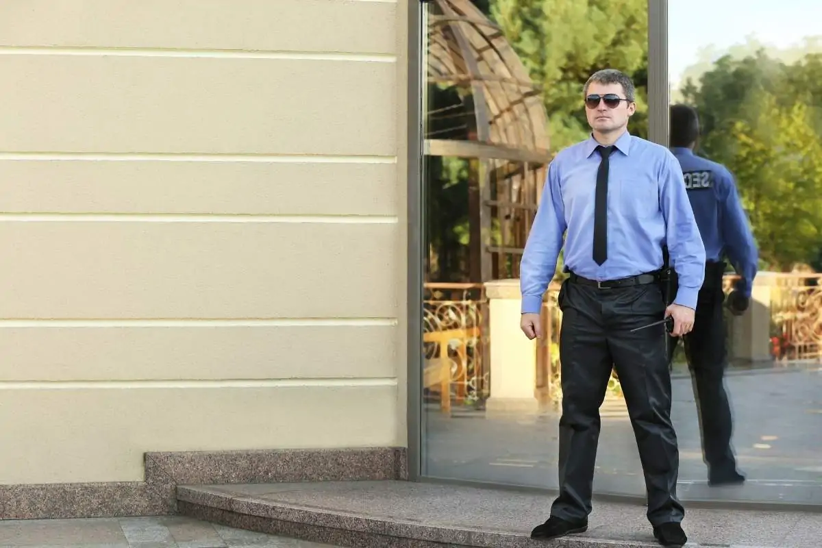 Mall security guard standing at entrance