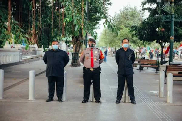 Security personnel managing access control