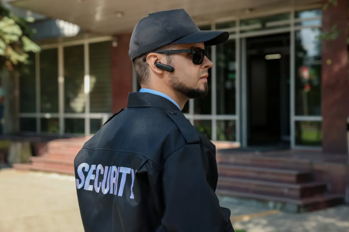 Security guard patrolling an event area.